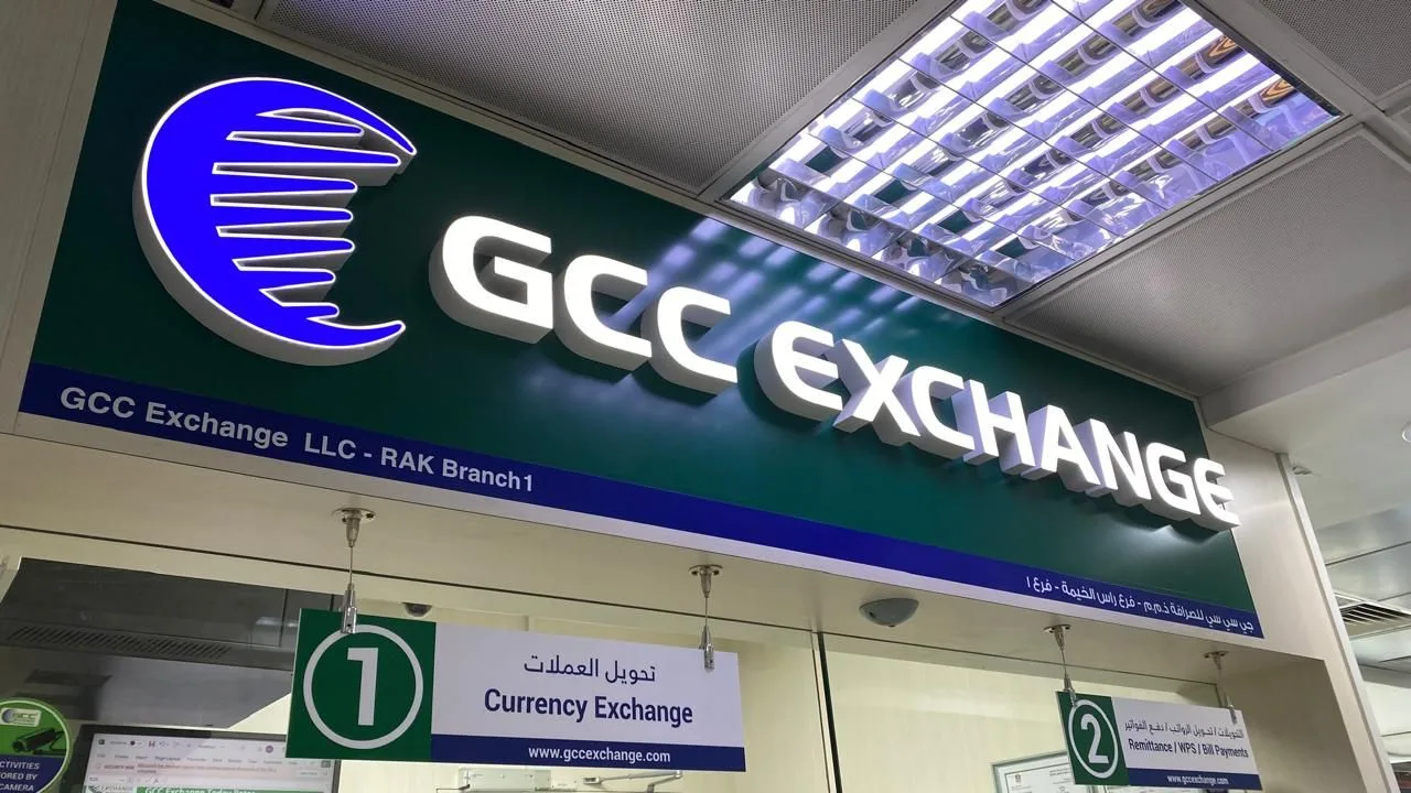 Illuminated lightbox fascia and counter number signs for a currency exchange branch in a mall