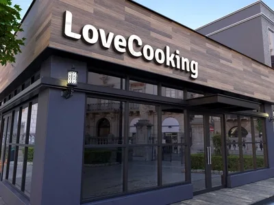Illuminated fascia sign on a restaurant frontage