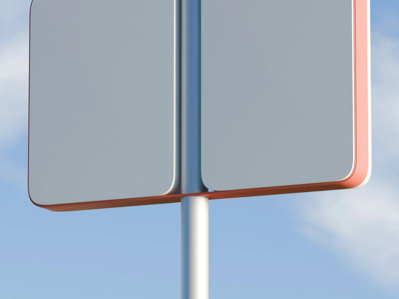 Blank double-sided pylon sign panels mounted on a tall pole against a blue sky